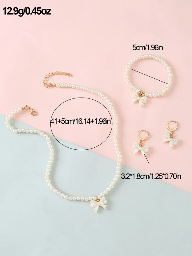 تايك تو Take Two Set of 3 - Bow Pendant Faux Pearl Necklace, Bracelet, and Earring