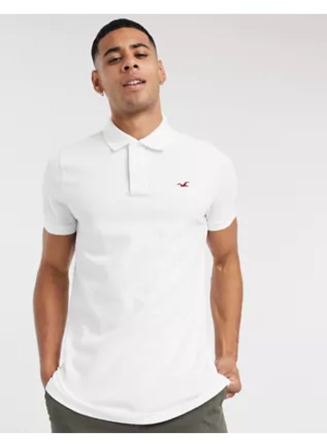 هوليستر تيشيرت بولو هولستر للرجال، باللون الأبيض مع شعار أيقوني، بأكمام قصيرة وياقة بولو، مقاس XL، ملابس كاجوال مريحة