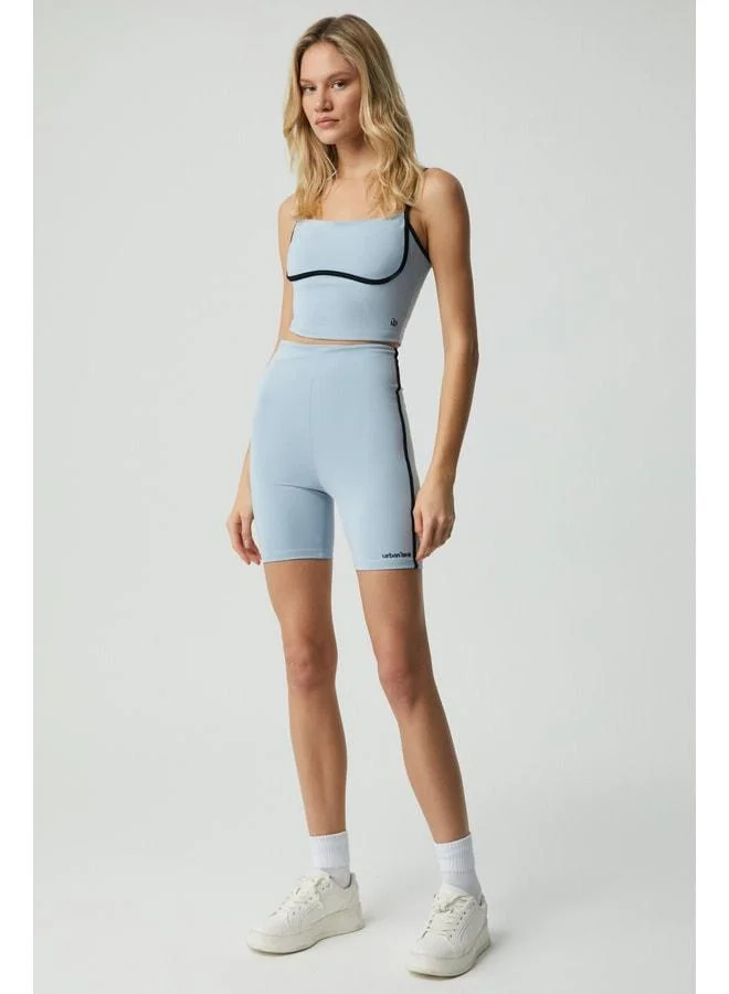 PHARSA Women's Ultra-Soft Light Blue Shorts with Piping Detail.