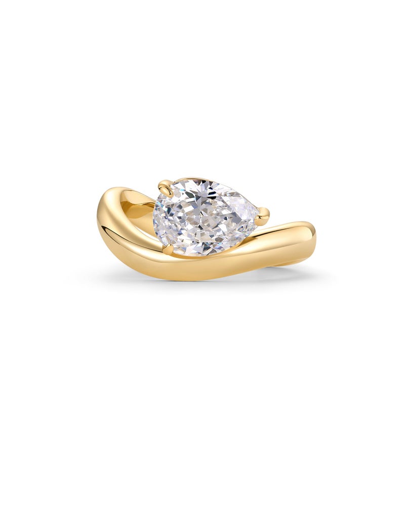 PAVOI 14K Yellow Gold Plated Pear Solitaire Premium Cubic Zirconia Engagement Ring for Women - Trendy Fake Wedding Band - Wavy Promise Ring - Size 6 - Image 1