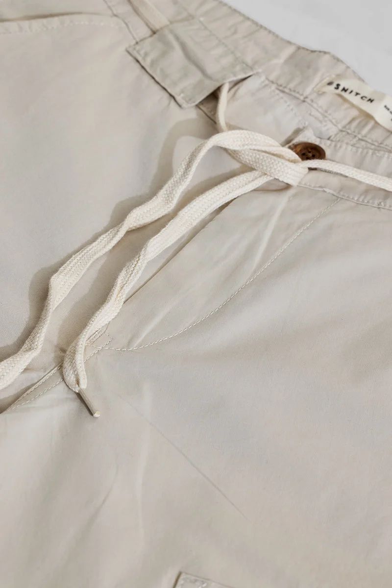 SNITCH بنطلون كارجو بيج فاتح بخصر متوسط وقصة مريحة