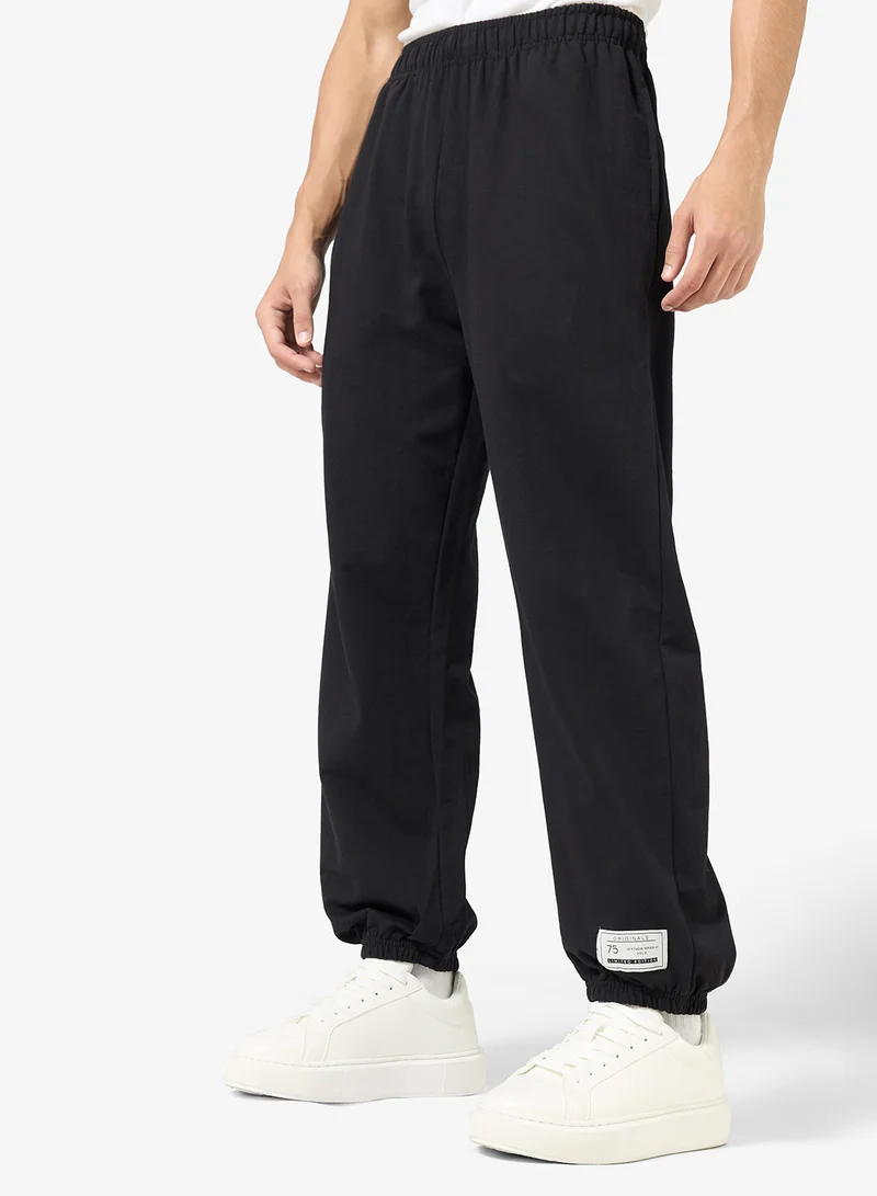 Seventy Five Badge Detail Relaxed Oversized Joggers