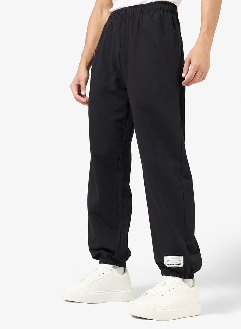 Seventy Five Badge Detail Relaxed Oversized Joggers - Image 1