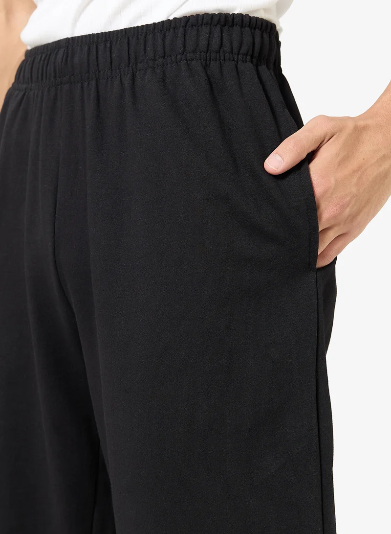 Seventy Five  Badge Detail Relaxed Oversized Joggers for Men | Best Price UAE