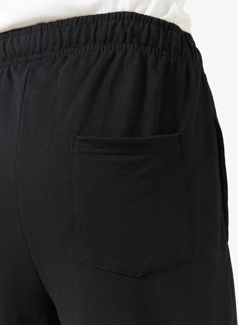 Seventy Five  Badge Detail Relaxed Oversized Joggers for Men | Best Price UAE