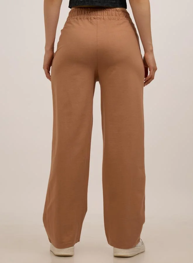 Outzidr  Brown Side Cut And Sew Printed Joggers for Women | Best Price UAE