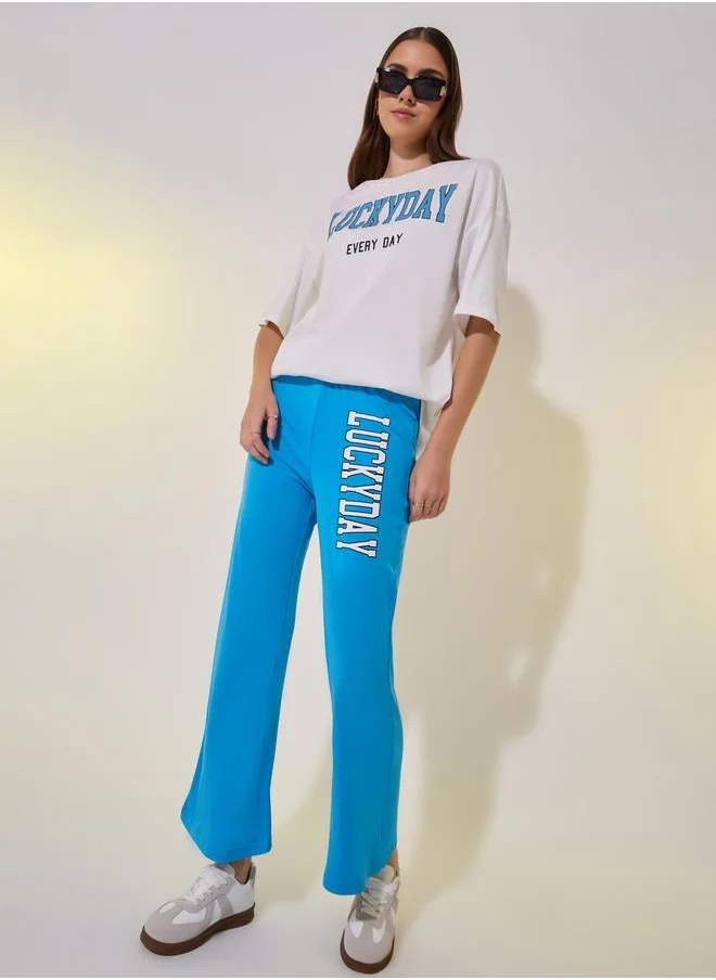 ستايلي Slogan Round Neck T-Shirt and Ankle-Length Pants Set