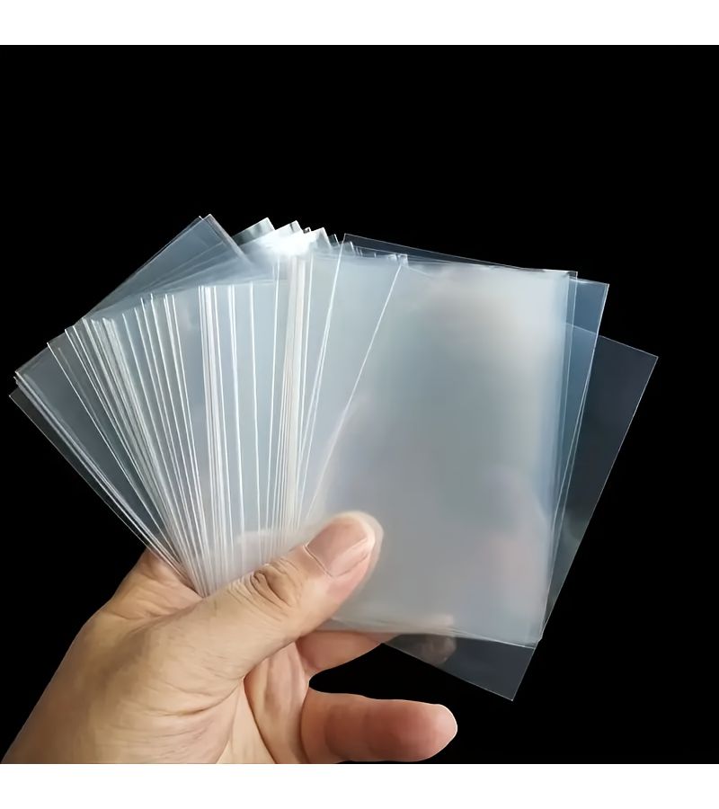 100 قطعة غطاء واقٍ شفاف ناعم للبطاقات مقاس 65 × 90 مم - Image 1