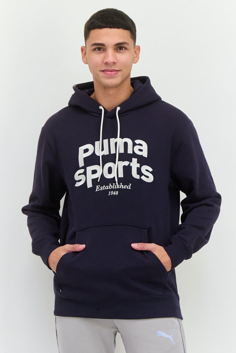 PUMA Men Sportswear Fit Long Sleeve Hooded Sweatshirt, Navy - Image 1