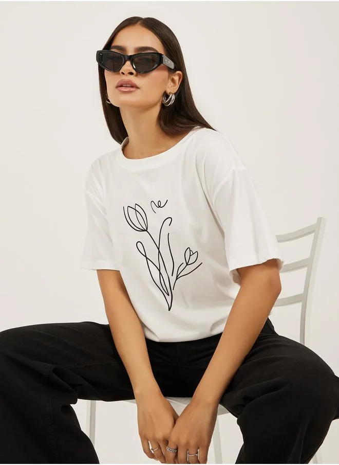 ستايلي Styli Women White Graphic Print Short Sleeve Oversized T-Shirt
