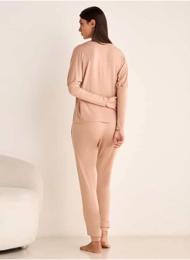 Aadaraya Aadaraya Drop Shoulder Long Sleeve T-shirt and Elasticated Joggers Set