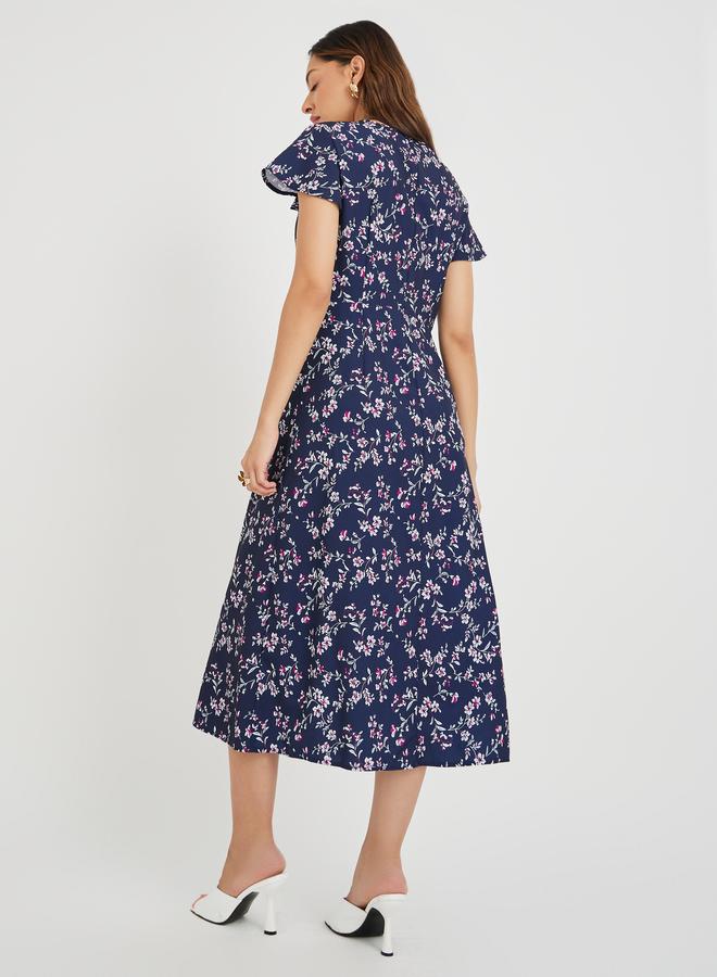 تايك تو فستان ميدي نسائي أزرق داكن بطبعات زهور وأزرار أمامية - Image 4
