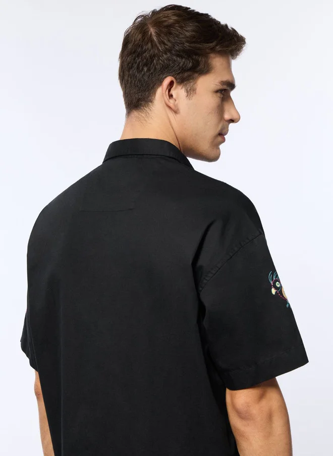 The Souled Store  The Souled Store Men Tropic Tails Printed Black Oversized Shirt  | Best Price UAE