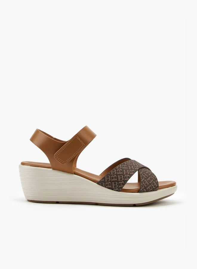 Flora Bella By Shoexpress Cross Strap Monogram Print Sandals with Hook and Loop Closure
