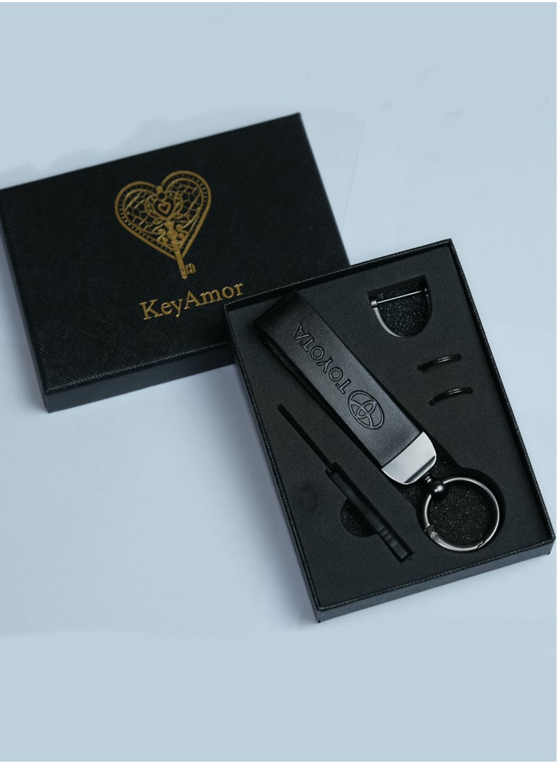 KeyAmor Elegant black metal and leather keychain with TOYOTA logo featuring 3 key rings perfect as a fancy gift or car accessory designed in sleek black for a modern look offers 360 degree rotation for convenience suitable for both men and women and comes in a fancy gift box  - Image 1