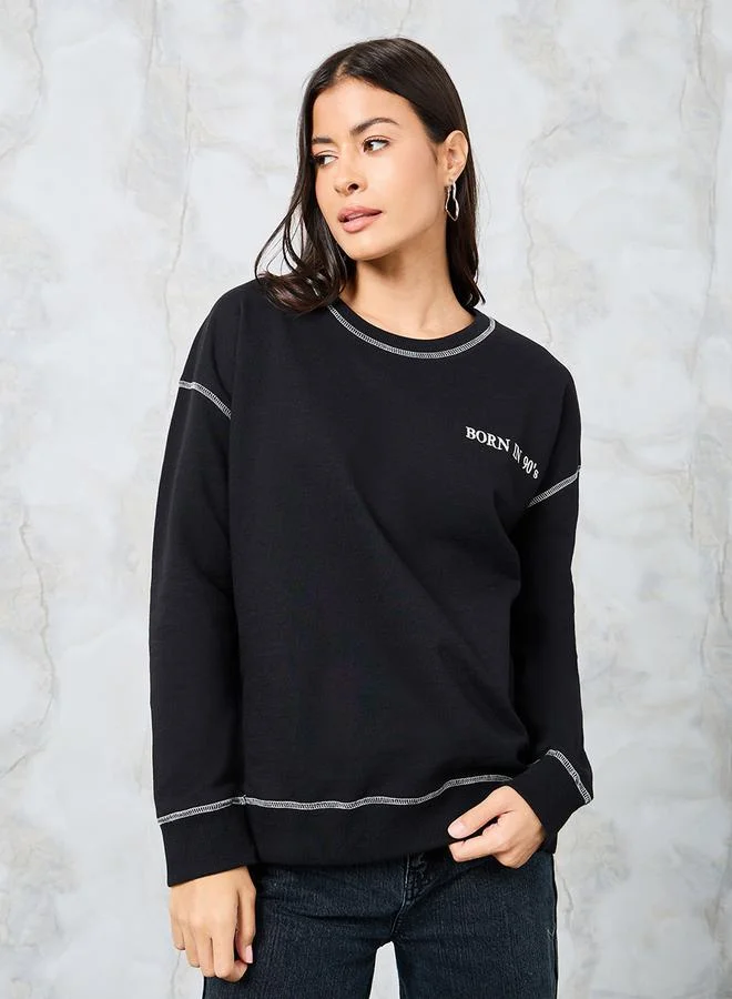 Styli Oversized Embroidered Slogan Sweatshirt with Contrast Stitch