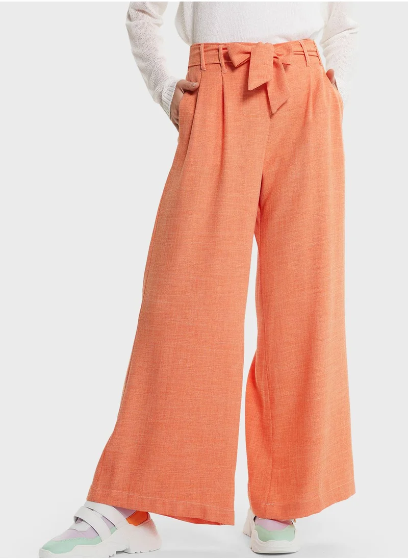 Muni Muni Belted Flared Bottom Pants