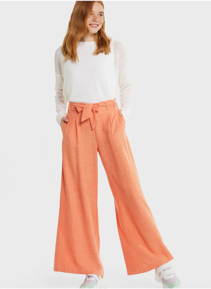 Muni Muni Belted Flared Bottom Pants