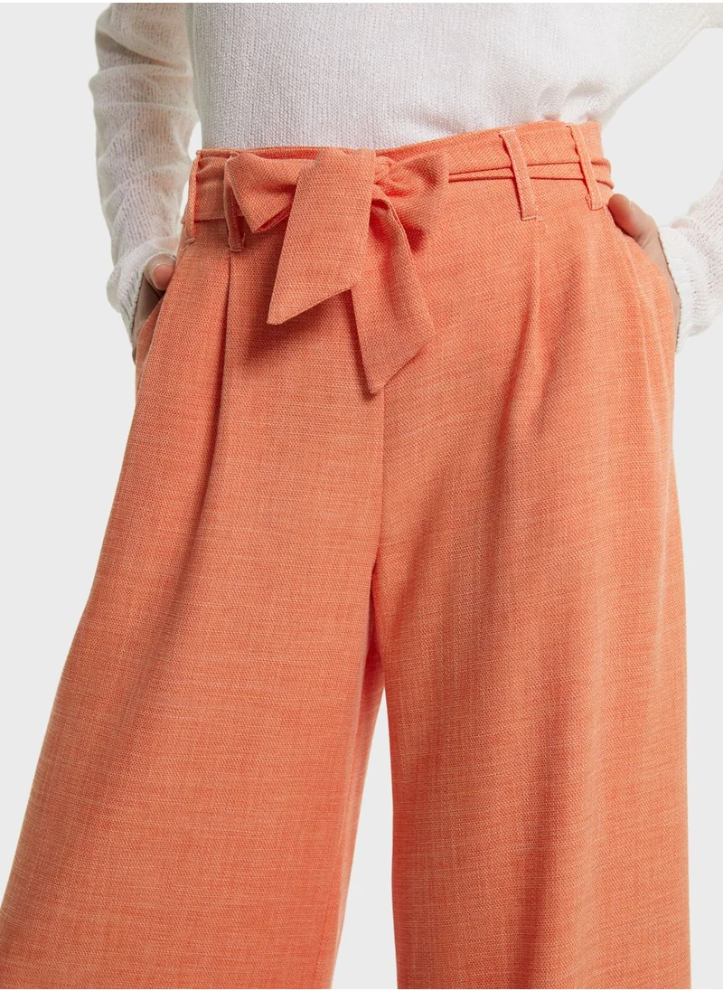 Muni Muni Belted Flared Bottom Pants