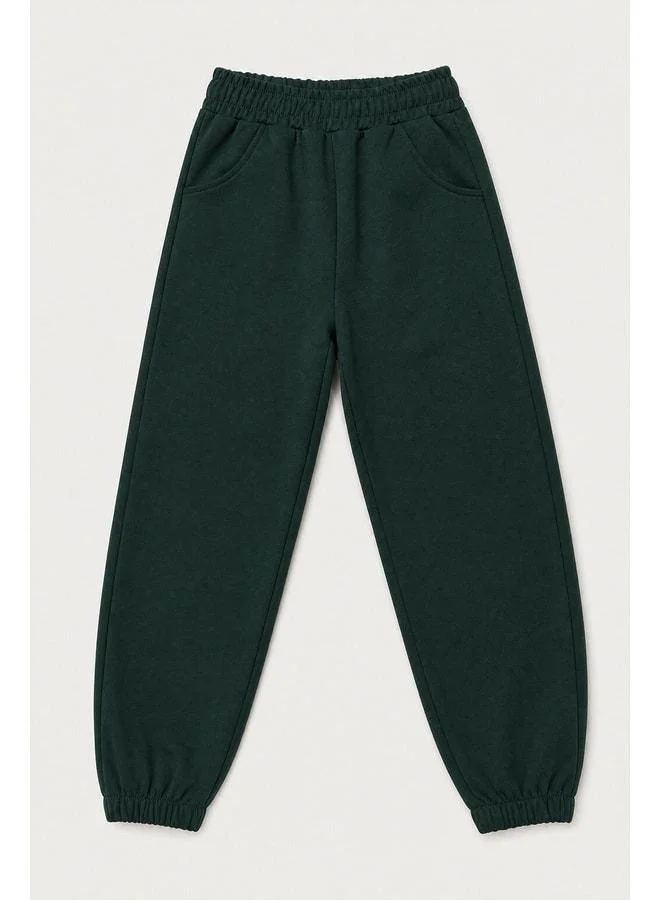 Perendi Elastic Comfortable Fit Pocketed Unisex Jogger Pants for Boys and Girls.