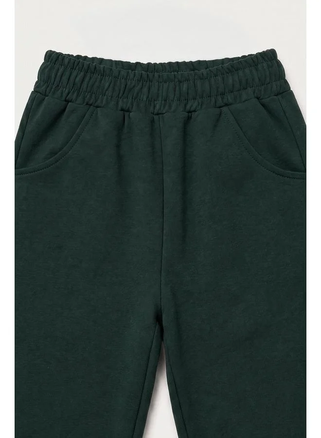 Perendi Elastic Comfortable Fit Pocketed Unisex Jogger Pants for Boys and Girls.