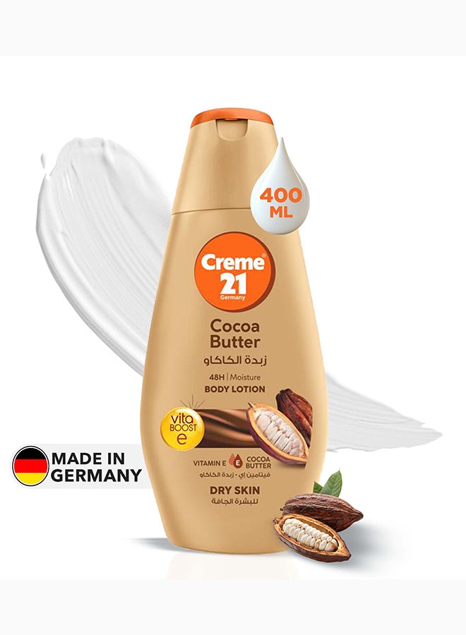 Creme 21 لوشن الجسم بزبدة الكاكاو | تغذية عميقة للبشرة العادية إلى الجافة | ترطيب لمدة 48 ساعة مع حماية فيتامين E | عطر كاكاو يدوم طويلاً | مختبر جلدياً ومصنوع في ألمانيا - Image 1