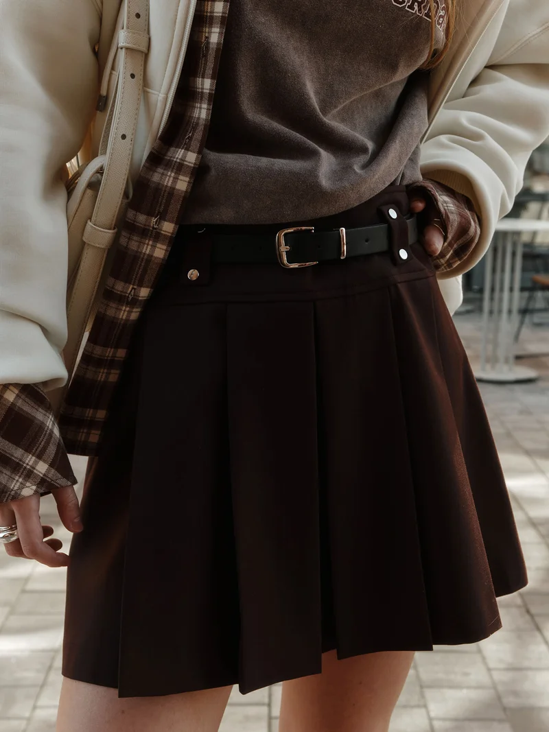 Lichi Mini pleated skirt with eco-leather belt