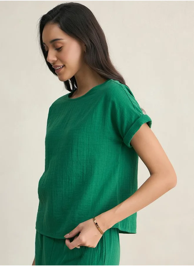 Femmella Solid Crinkled Turn-Up Sleeve Top by Styli
