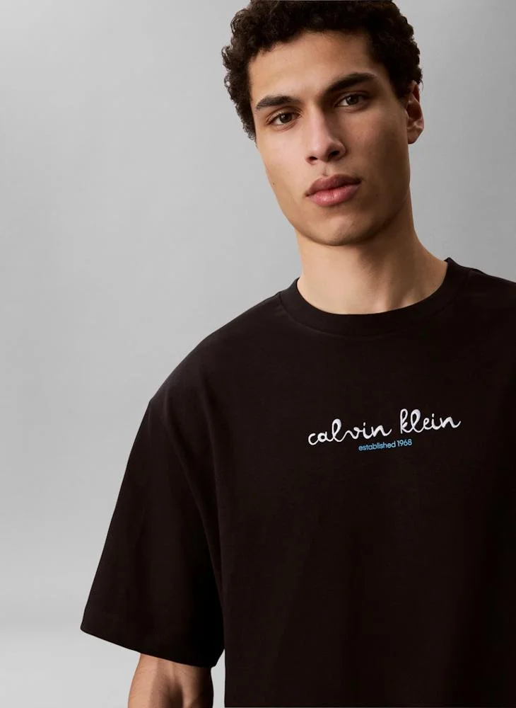 Calvin Klein Jeans Black Line Logo Graphic Relaxed T‑Shirt for Men | Best Price UAE
