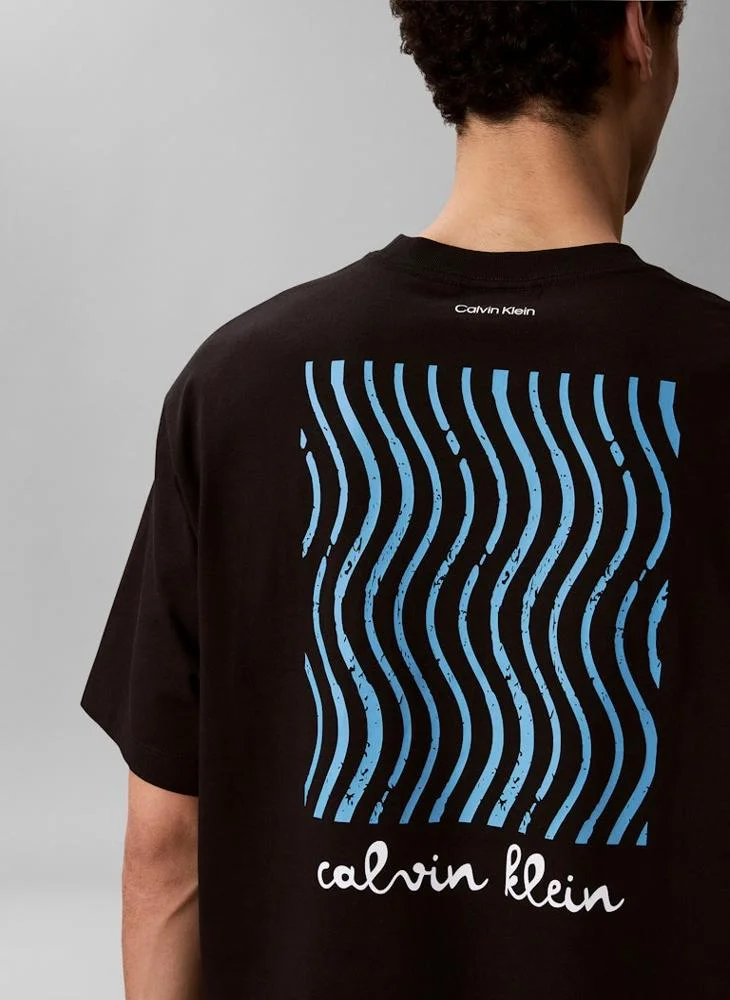Calvin Klein Jeans Black Line Logo Graphic Relaxed T‑Shirt for Men | Best Price UAE