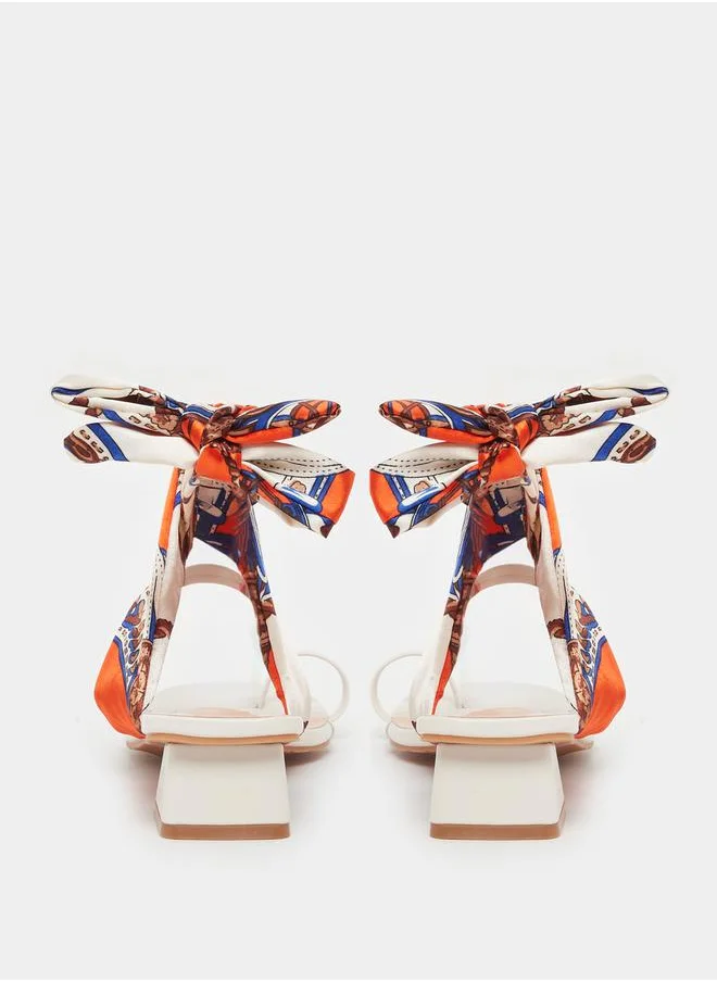 ستايلي Open Toe Block Heel Sandals with Printed Scarf