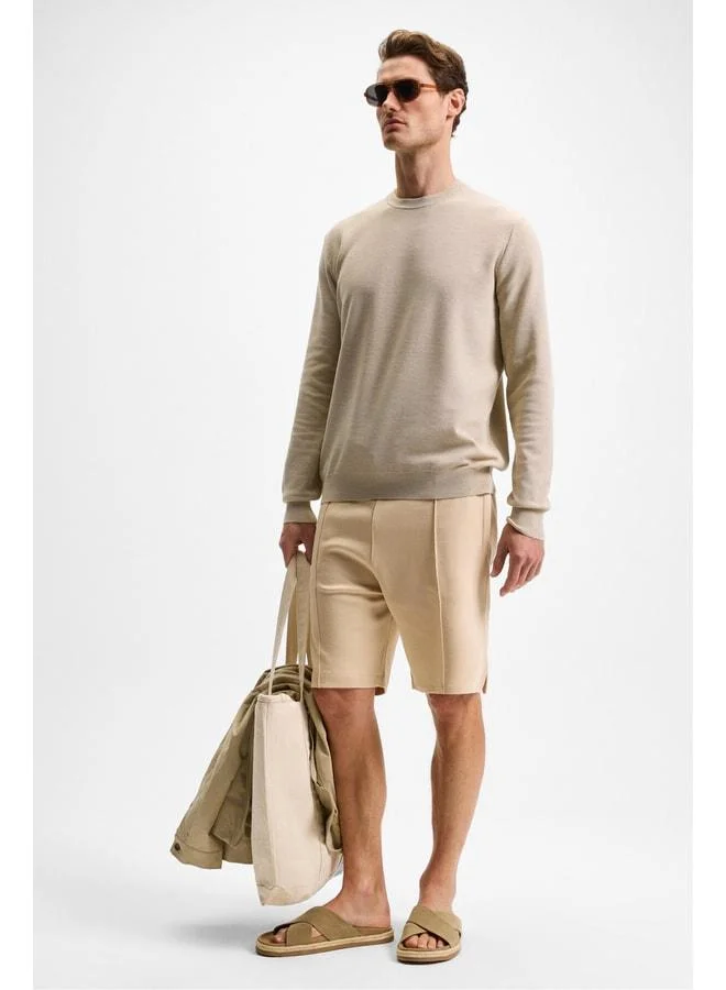 Grimelange MATSEN Men's Elastic Waist Relaxed Beige Shorts with Side and Back Pockets.