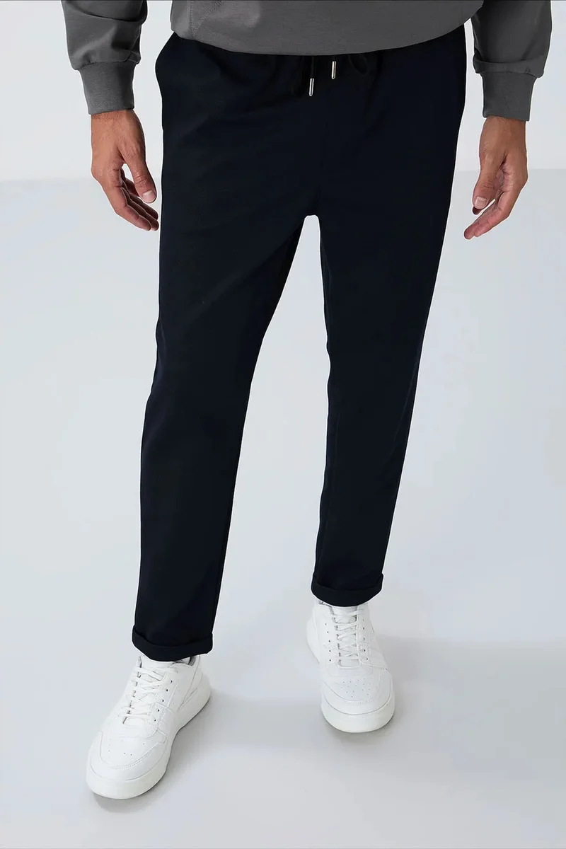 تومي لايف TOMMY Men's Textured Tapered Sweatpants