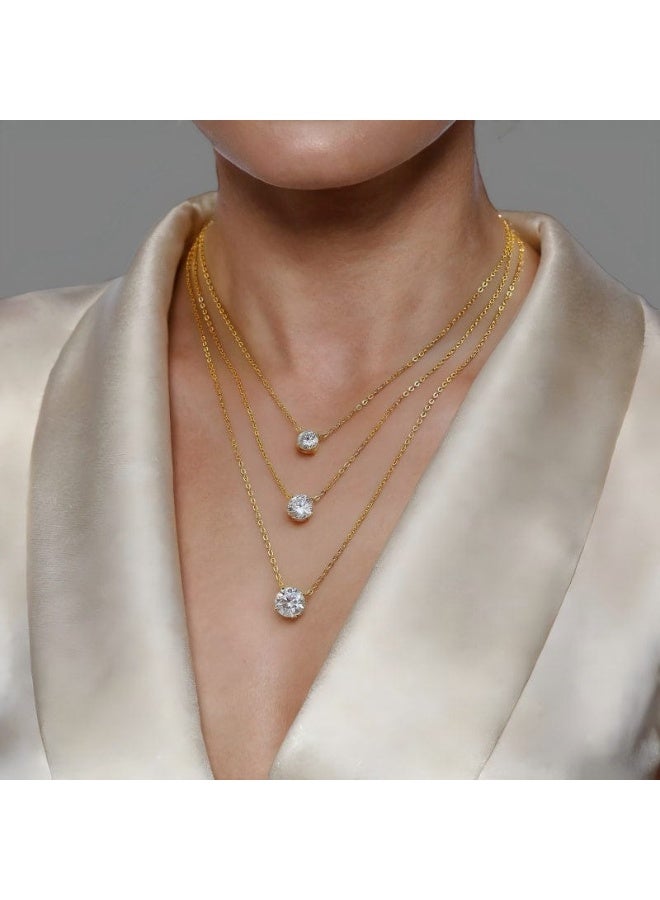 Luxuria A stylish and modern necklace made of 18-karat gold-plated stainless steel, with a simple and luxurious design, set with floating cubic zirconia stones, in three layers, suitable for women, and makes an ideal birthday gift. - Image 1