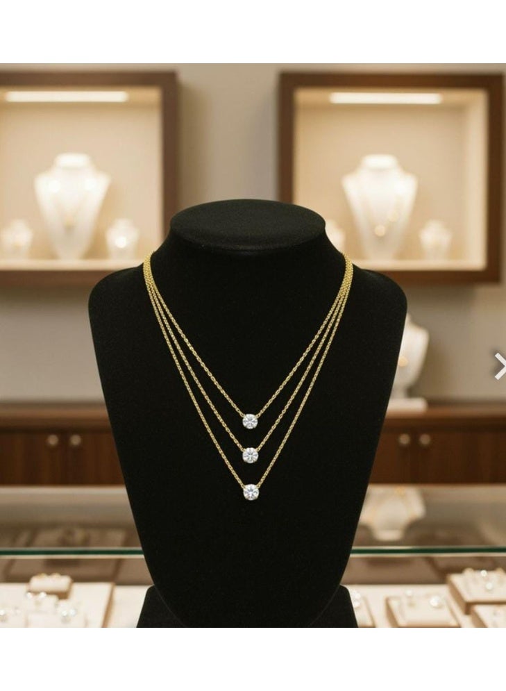 Luxuria A stylish and modern necklace made of 18-karat gold-plated stainless steel, with a simple and luxurious design, set with floating cubic zirconia stones, in three layers, suitable for women, and makes an ideal birthday gift. - Image 2