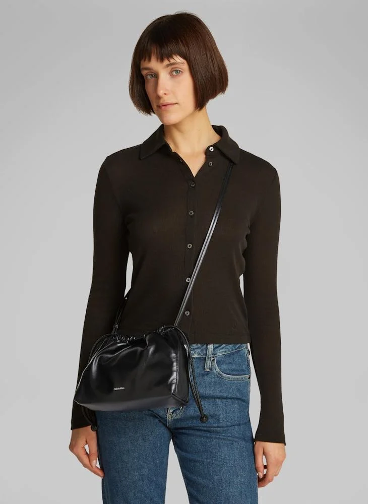 كالفن كلاين جينز DRAWSTRING CROSSBODY BAG