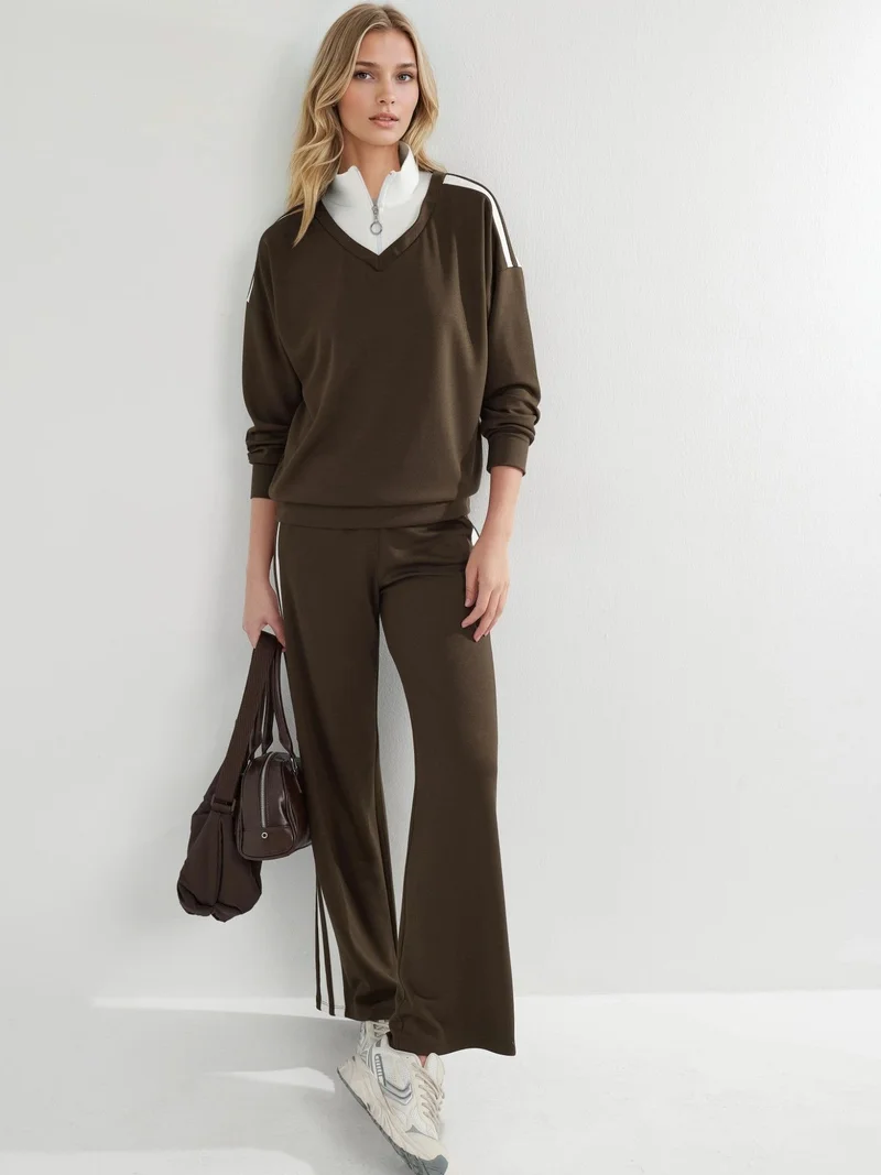 زوبعة طقم نسائي واسع الساق بسحاب وياقة مودال من مجموعة بيرسان