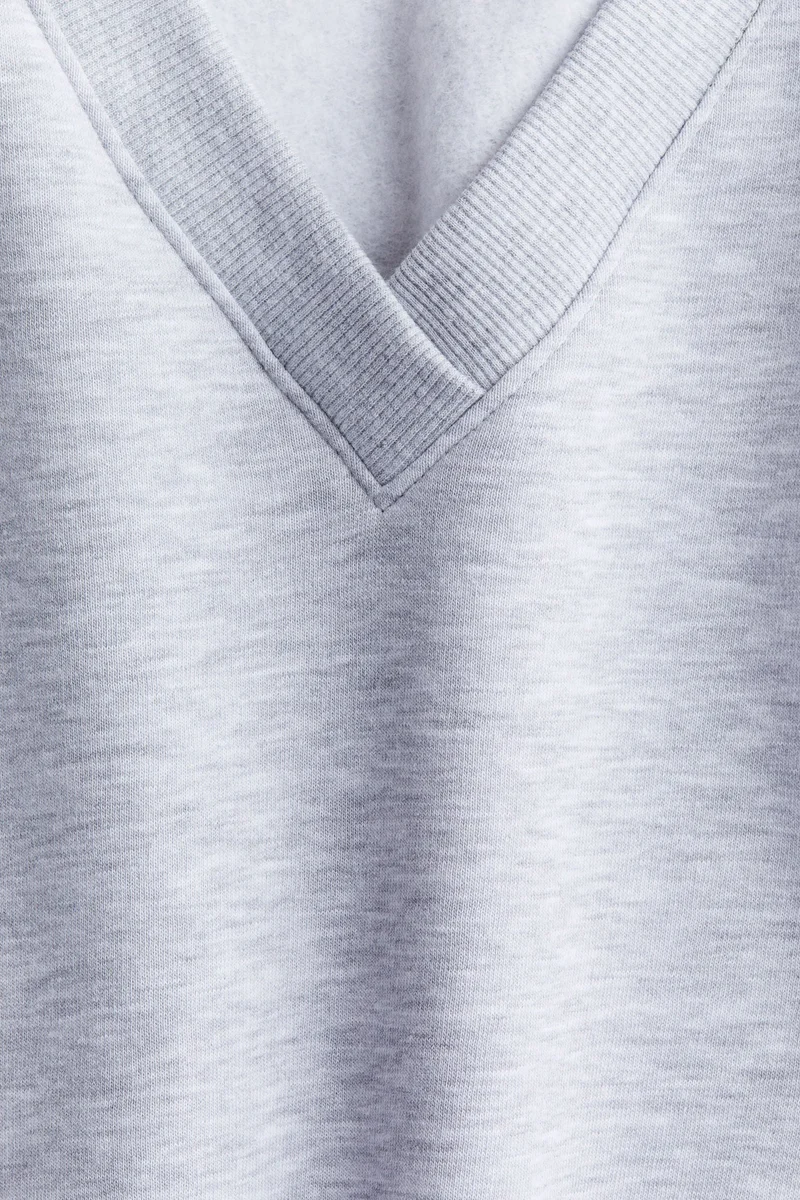 اتش اند ام سترة بياقة على شكل حرف