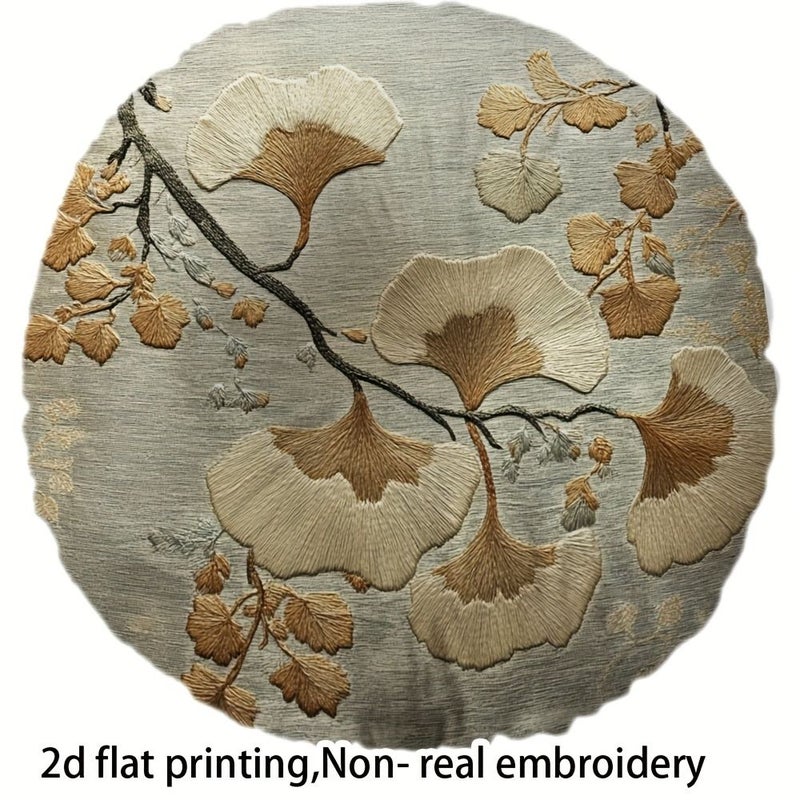 وسادة مستديرة مزدوجة الجوانب بحجم 16x16 بوصة باللون البيج، مزينة بأوراق الجنكو المتساقطة - Image 1