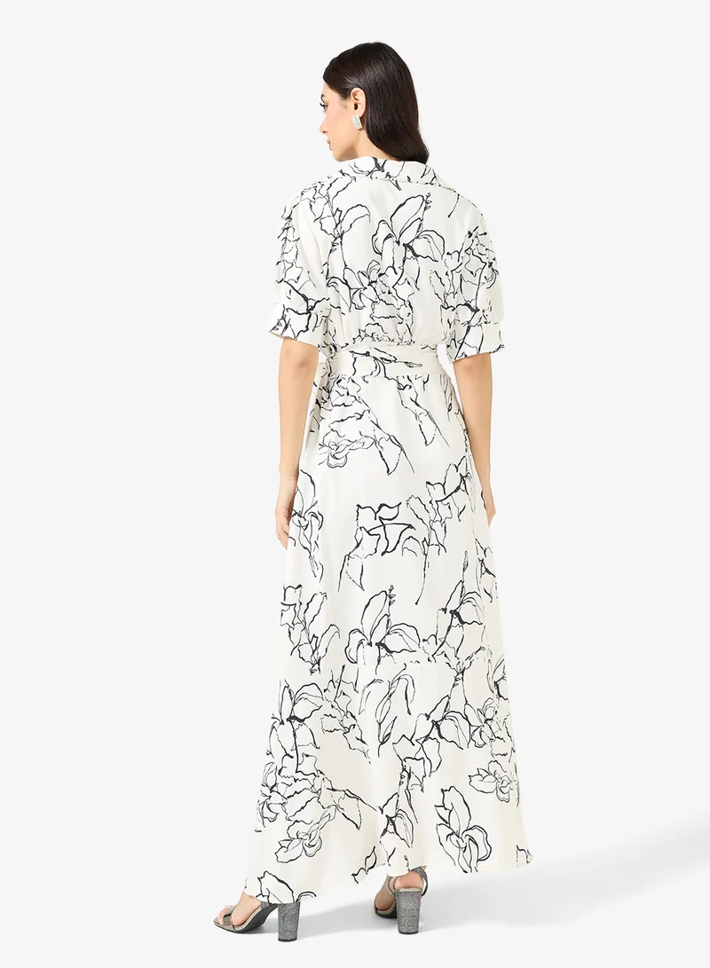 خزانة طقم بلوزة وتنورة مطبوعة