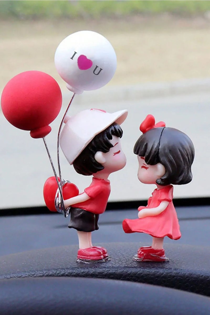 Car Decoration – A Set of 2 Romantic Car Dashboard Ornaments Featuring a Boy and Girl with Balloons. A cute and romantic design that adds a special touch to your car interior. Perfect as a gift for Valentine's Day, anniversaries, or birthdays for someone you love. - Image 1