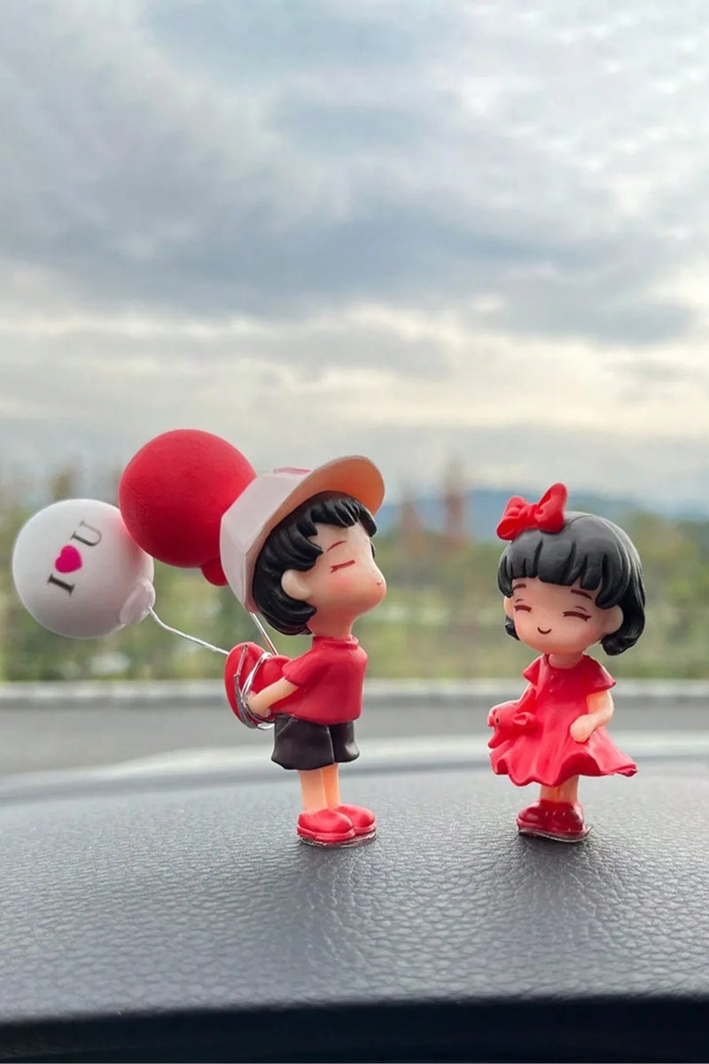 Car Decoration – A Set of 2 Romantic Car Dashboard Ornaments Featuring a Boy and Girl with Balloons. A cute and romantic design that adds a special touch to your car interior. Perfect as a gift for Valentine's Day, anniversaries, or birthdays for someone you love. - Image 2