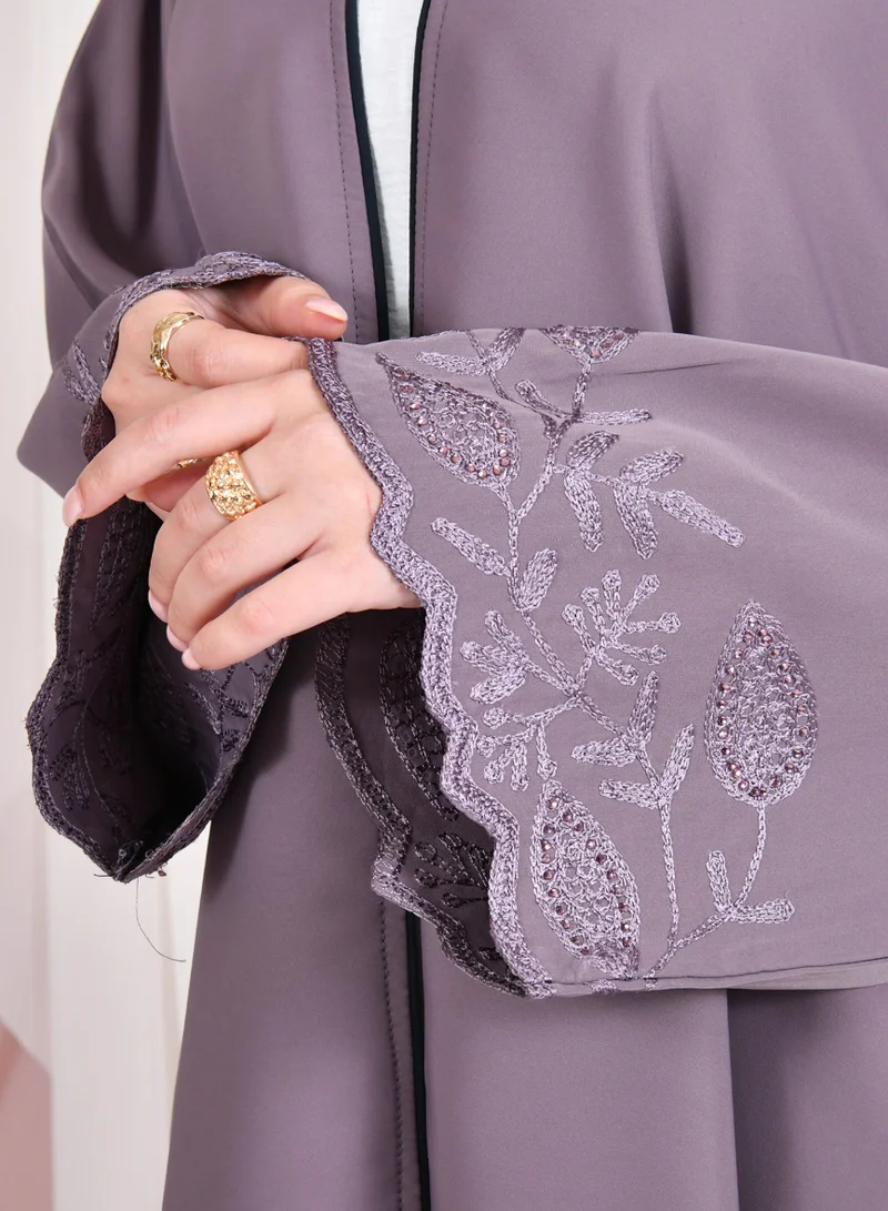 HAWRAA ABAYA Purple wrap abaya with a quarter-circle, made of summer fabric, with embroidery decorated with stones on the sleeves and the bottom of the abaya