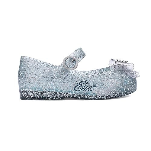 Mini Melissa حذاء ميني ميليسا للبنات - حب حلو + حذاء ماري جين من ديزني برينسيس للأطفال والرضع - أحذية جلي للأطفال الصغيرات مع حزام قابل للتعديل ودبوس جانبي، أزرق/إلسا 11 طفل صغير م - Image 1