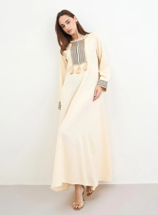 Amirah Women Cream Embroidered Tasselled Jalabiya