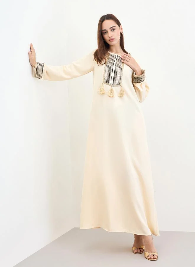 Amirah Women Cream Embroidered Tasselled Jalabiya