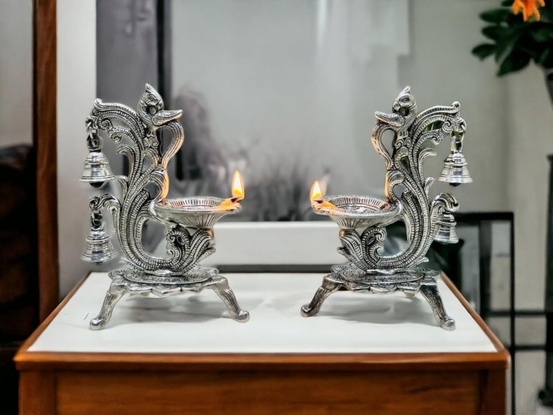 SAUDEEP INDIA Saudeep India Oxidized Metal Diya for Puja Brass Oil Diwali Lamp in Peacock Design Perfect Gift Item Antique Decorative Akhand Diya Home Decor Temple Pooja RoomSilver14x9x20cm Pack of 2 