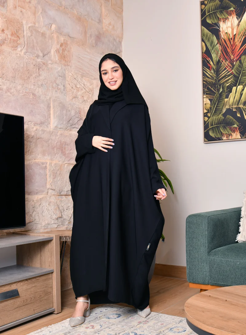 HAWRAA ABAYA Black wrap abaya with an elegant formal design and a wide cut