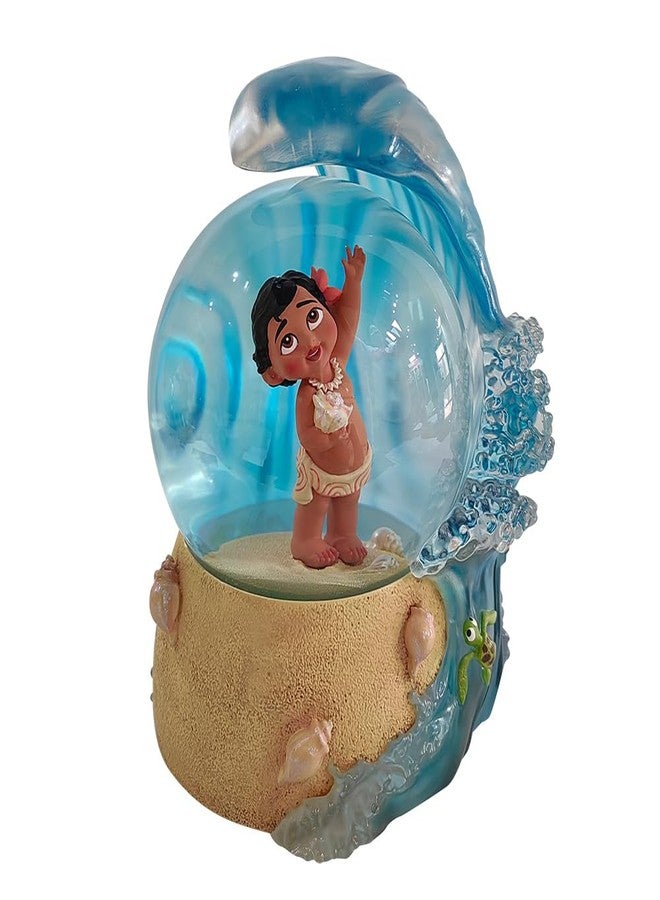 Enesco Disney Showcase Baby Moana Holding a Shell Waterball Waterglobe, 6.25 Inch, Multicolor - Image 1