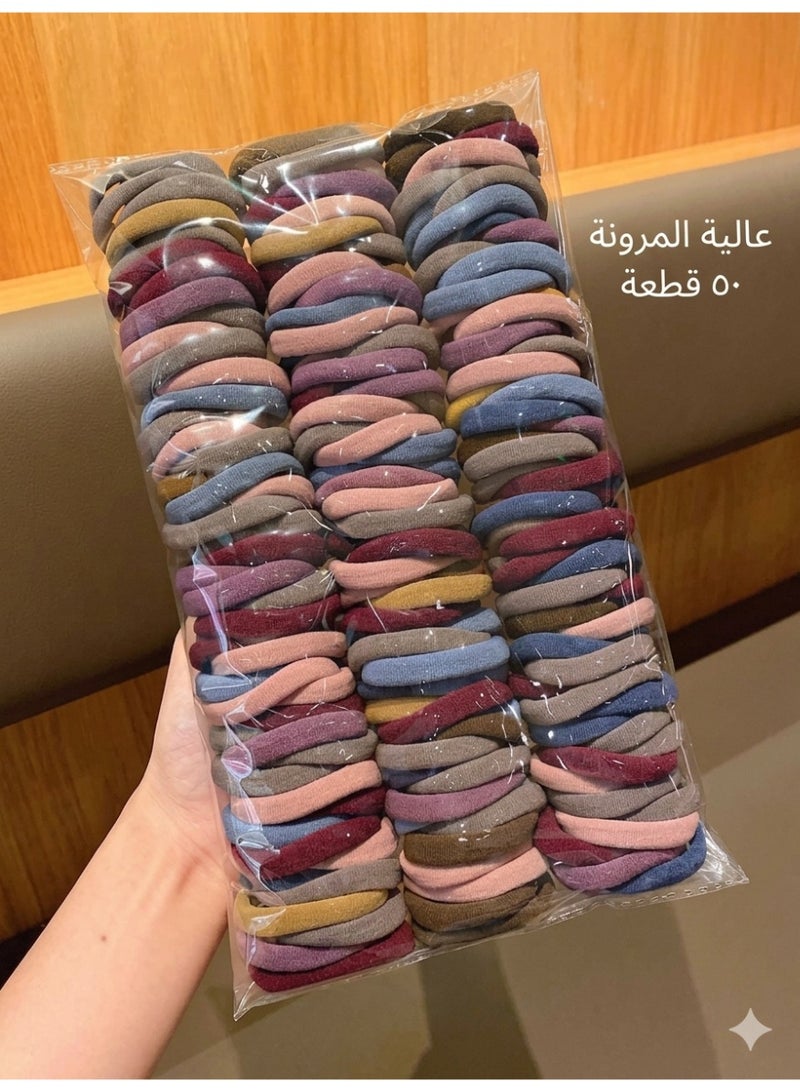 ربطات الشعر المرنة الملونة 50 قطعة عشوائية اللون  والمصممة لتكون متينة ومناسبة للاستخدام اليومي. هذه الربطات تتميز بمرونة عالية - Image 1